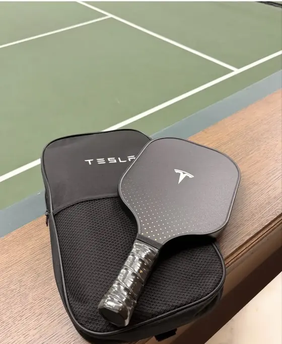 Tesla branded pickleball paddle with a matching printed neoprene cover