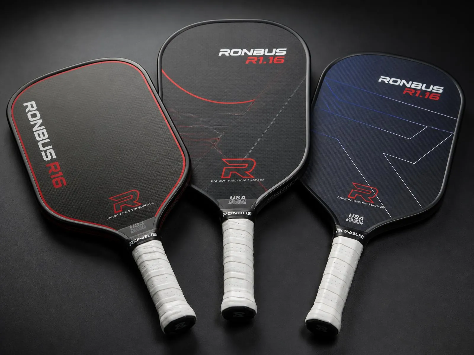 Two pickleball paddles meeting over the net on an outdoor court